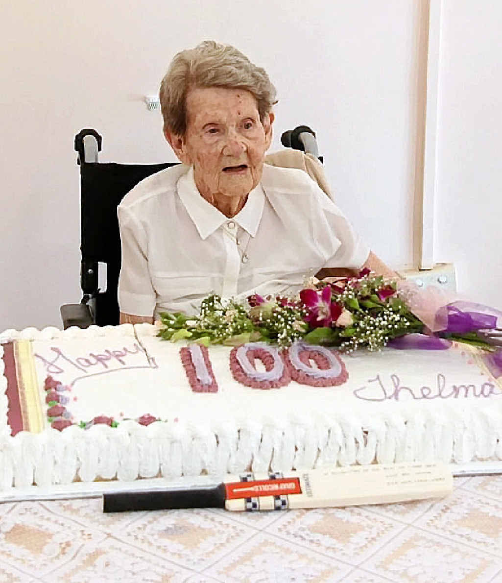 CELEBRATING CENTURY: Thelma Marshall with her 100th birthday cake. RIGHT: Thelma with her children (back row, from left) Bernard Marshall, Mary Brosnan, Bernadette Cullen (front row) James Marshall, Thelma Marshall and Margaret Miller. CELEBRATING CENTURY: Thelma Marshall with her 100th birthday cake. RIGHT: Thelma with her children (back row, from left) Bernard Marshall, Mary Brosnan, Bernadette Cullen (front row) James Marshall, Thelma Marshall and Margaret Miller.